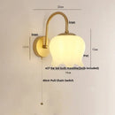 Modern gold led wall sconce with frosted glass for stairway lighting
