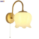 Modern gold led wall sconce with frosted glass for stairway lighting