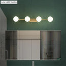 Modern gold linear wall sconce with milky ball glass for bathroom