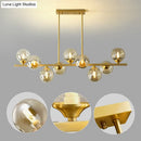 Modern gold metal amber glass island light for dining room