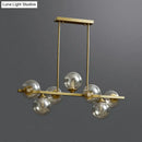 Modern gold metal amber glass island light for dining room