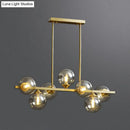 Modern gold metal amber glass island light for dining room