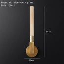 Modern gold metal and glass wall sconce light for bathroom