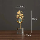 Modern gold metal eye magnifying glass with glass base living room decor