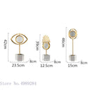 Modern gold metal eye magnifying glass with glass base living room decor