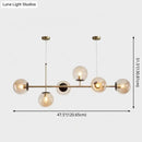 Modern gold metal island pendant with blue glass spheres dining room