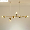 Modern gold metal island pendant with blue glass spheres dining room