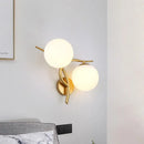 Modern gold milk glass orb sconce light bedroom wall fixture