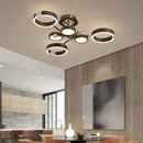 Modern gold plated chandelier with black arms for living room