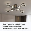 Modern gold plated chandelier with black arms for living room