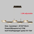 Modern gold plated chandelier with black arms for living room