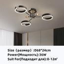 Modern gold plated chandelier with black arms for living room