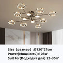 Modern gold plated chandelier with black arms for living room