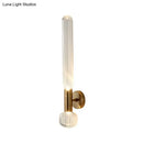 Modern gold ribbed glass wall lighting fixture for bedroom
