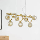 Modern gold round pendant dining room cognac glass linear design