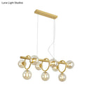 Modern gold round pendant dining room cognac glass linear design