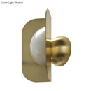 Modern gold sconce light with curved metal shade bedroom lamp