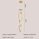 Modern gold steel pendant light interlocking rings dining room