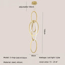 Modern gold steel pendant light interlocking rings dining room