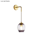 Modern gold tulip wall lamp with blue glass shade for bedroom