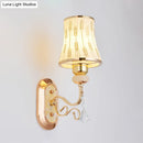 Modern gold wall lamp with arc wheat patterned glass bedroom sconce