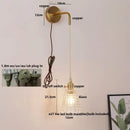 Modern gold wall lamp with clear glass shade – bedroom pull chain