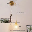 Modern gold wall lamp with clear glass shade – bedroom pull chain