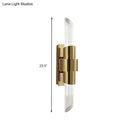 Modern gold wall lamp with prismatic crystal shade for bedroom