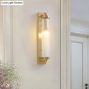 Modern gold wall light fixture with frosted glass for living room
