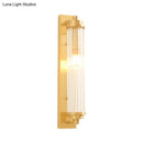 Modern gold wall light fixture with frosted glass for living room