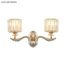 Modern gold wall light with clear crystal shade – living room sconce