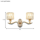Modern gold wall light with clear crystal shade – living room sconce