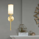 Modern gold wall sconce with milky glass shade for living room