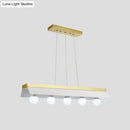 Modern gold & wood pendant light with black & white shade dining room