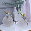 Modern golden bird brass sculpture living room decor with blue crystal