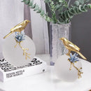Modern golden bird brass sculpture living room decor with blue crystal