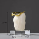 Modern golden bird statue with stone base living room ornament