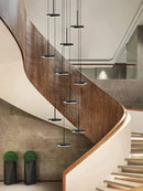 Modern golden black led long chandelier for staircase dining room