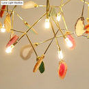 Modern golden branch led island light with orange agate accent kitchen