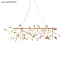 Modern golden branch led island light with orange agate accent kitchen