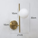 Modern golden led wall lights with milky glass spheres bedroom sconce