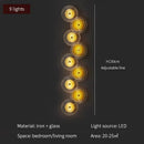 Modern golden radial crystal wall lamp for living room