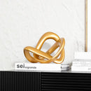 Modern golden twisted dough rope knot sculpture living room decor