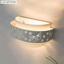 Modern gray metal wall sconce – living room warm glow light