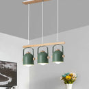 Modern green dome island light with wood accents for kitchen dining
