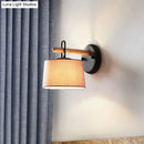Modern grey drum shade wall lamp with wood arm for bedroom lighting