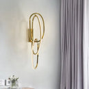 Modern interlocking oval gold wall sconce lighting fixture bedroom