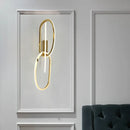 Modern interlocking oval gold wall sconce lighting fixture bedroom