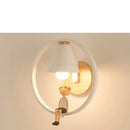 Modern iron led wall lamps with child figurine for bedroom