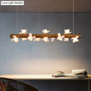 Modern linear brown wood island pendant – kitchen dining room light